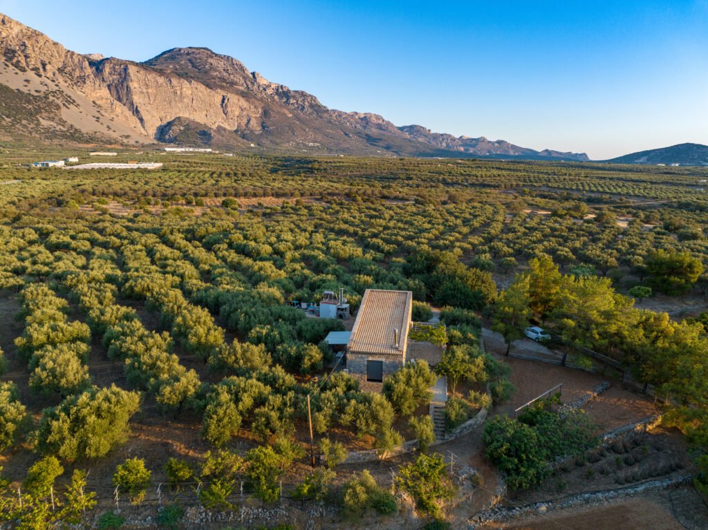 Modern stone eco house overlooking olive groves and the Ha Gorge landscape in East Crete near Kavousi